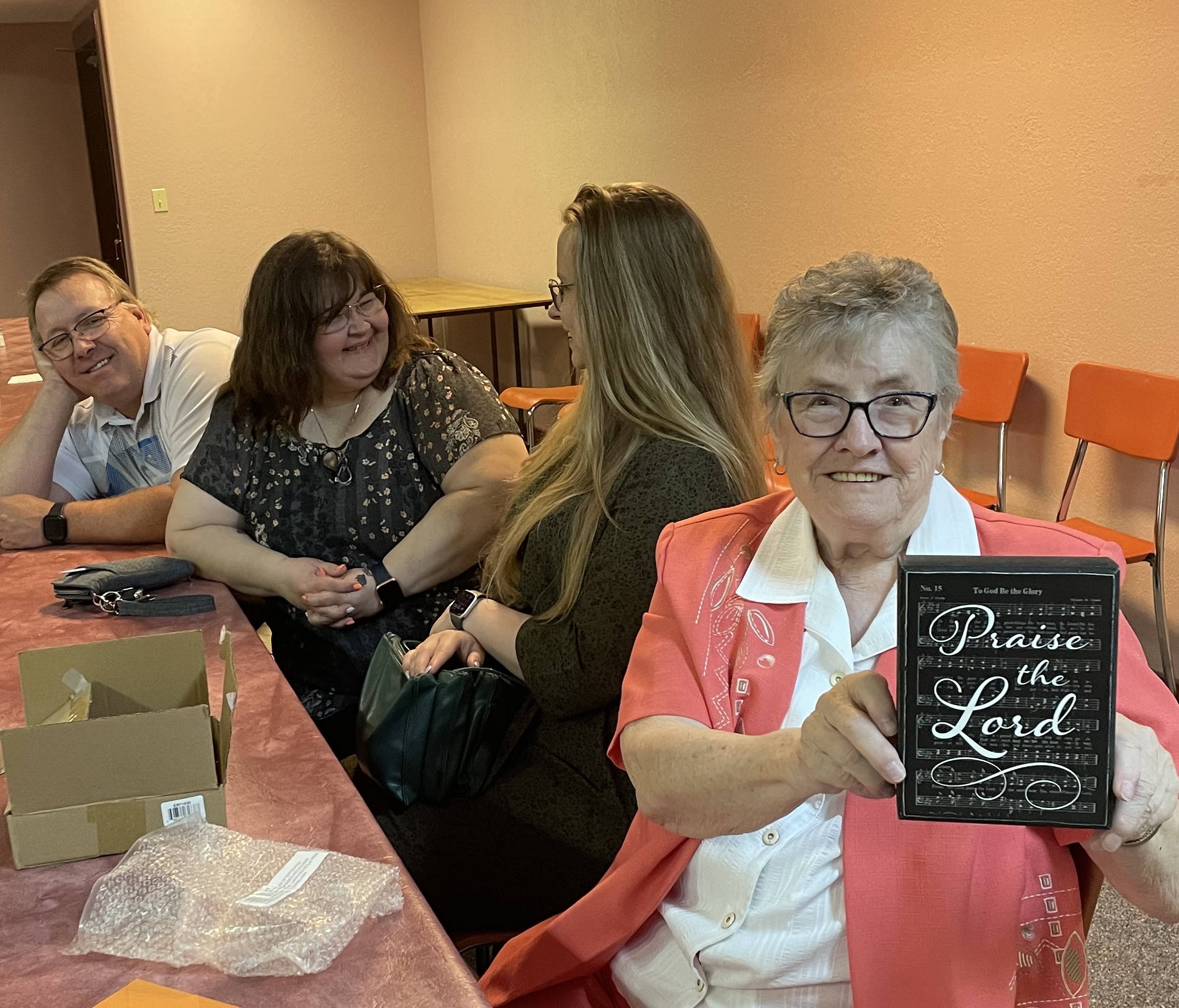 Weneen holding her plaque